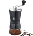 Kaffekværn manuel med 8 kværn niveauer Kaffemøllen kan male kaffe til 10 kopper kaffe ad en gang. Kan kværne 8 typer fra fint til meget groftmalet kaffe.