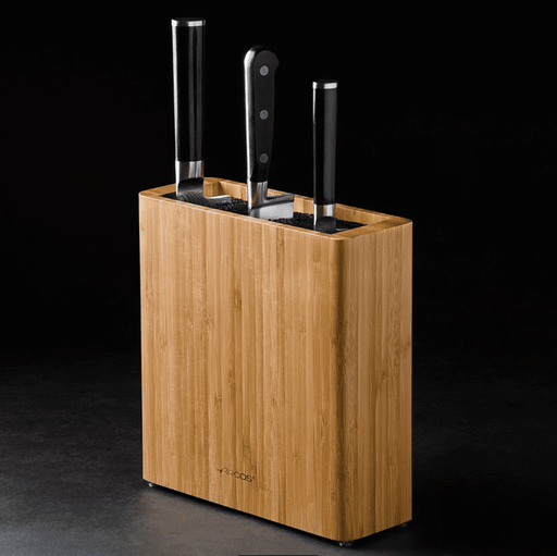 Knivblok i bambus H: 25 cm (Arcos Taco)  Universal bambus knivblok med indvendigt polypropylenfiber. Nem at rengøre. Det moderne og aktuelle design gør knivblokken til et nyttigt og dekorativt element i dit køkken. Det er det ideelle sted at efterlade dine køkkenknive, du undgår slitage, og har dem ved hånden.